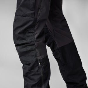 FjallRaven black technical trousers with zippered side vents and reinforced knee panels