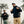 Two men wearing Fjallraven hiking gear and backpacks standing in a forest
