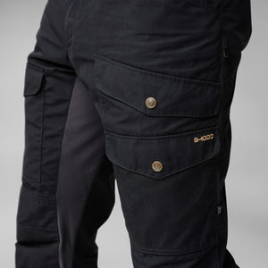 FjallRaven black trousers with G-1000 fabric label and buttoned cargo pockets