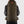 Person wearing a dark green Fjallraven Singi backpack from the back