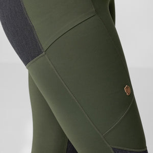 Close up of FjallRaven olive green leggings with dark grey textured side panels and logo patch