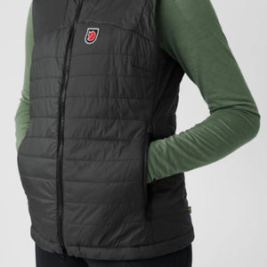 FjallRaven black quilted vest with zipper pockets and logo patch
