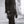 Person wearing black FNDN heated leather gloves with power button on wrist