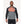 Man wearing a grey and black long sleeve compression shirt with orange grid pattern on chest and cuffs