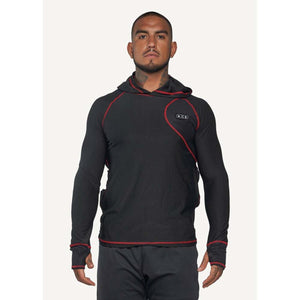 Man wearing a black long sleeve hooded shirt with red stitching and thumb holes