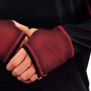 Close up of black long sleeve shirt with red gradient cuffs and red stitching