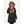 Woman wearing a black FNDN heated parka with a faux fur hood