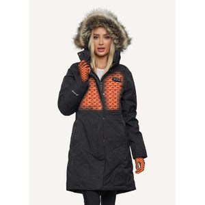 Woman wearing a black FNDN heated parka with a faux fur hood