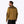 Man wearing a tan Mobile Warming jacket with brown shoulder and elbow patches viewed from the back