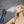 AlphaCool misting water bottle spraying mist onto a woman face