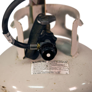 Propane tank valve assembly with warning label and hose connection