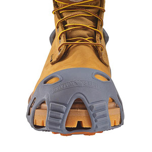 Winter Walking ice cleat attached to the toe of a tan work boot