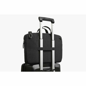 Bellroy black briefcase attached to luggage handle