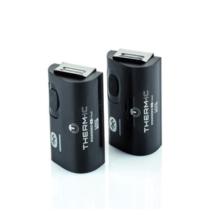 Two black Therm-ic C-Pack 1700 battery packs with metal clips