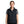 Woman wearing a black G-Tech quilted vest over a grey t-shirt