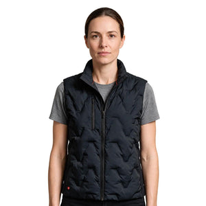 Woman wearing a black G-Tech quilted vest over a grey t-shirt