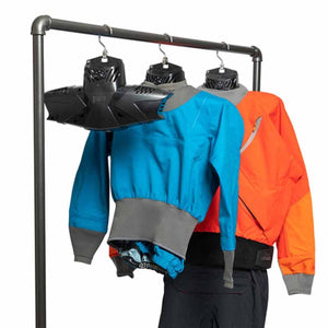 GearDryer drying systems hanging blue and orange drysuits on a metal rack