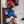 GearDryer wall rack holding a red POC helmet and two pairs of ski boots