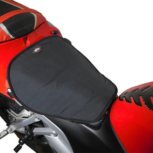 Gears Canada black motorcycle seat pad installed on a red motorcycle