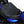 Gears Canada black motorcycle seat pad installed on a blue motorcycle