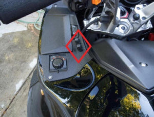 Gerbing dual temperature controller knobs mounted on motorcycle fairing
