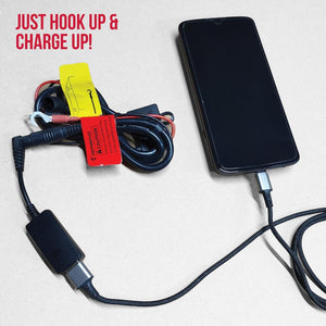 Gerbing battery charging cable connected to a smartphone