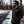Man wearing a black Gerbing puffer jacket standing on a snowy road