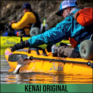 Angler wearing Glacier Glove gear fishing from a yellow kayak