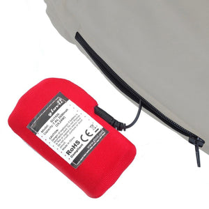 Glovii battery pack connected to a grey garment via a power cable