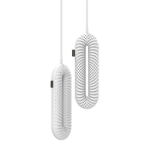 Two white Glovii shoe dryers with perforated oval designs hanging from power cords