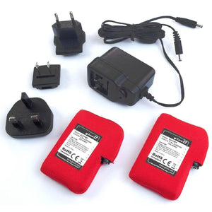 Glovii battery charger set with two red batteries and multiple international power adapters