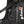 Glovii black vest with an integrated USB charging cable extending from a zippered pocket