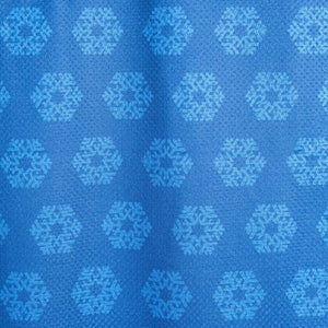 Blue fabric with a repeating snowflake pattern by Gobi Heat