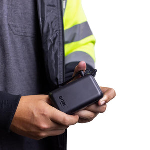 Person holding black Gobi Heat battery pack