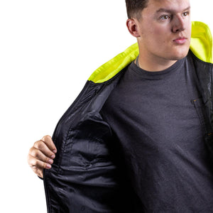 Man wearing a Gobi Heat black jacket with a high visibility yellow hood lining