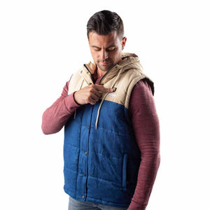Man wearing a blue and beige hooded Fobi heated vest