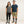 Man and woman wearing Gobi Heat grey heated socks with battery packs