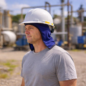 Worker wearing a Gobi Heat blue neck shade under a white hard hat at an industrial site