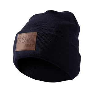 Navy blue Gobi Heat knit beanie with a brown leather logo patch