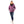 Woman wearing a purple Gobi Heat hooded puffer jacket with jeans and white sneakers