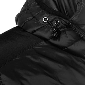 Close up of black quilted jacket hood with adjustable drawstring toggle
