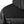 Close up of Gobi Heat black quilted jacket shoulder and hood