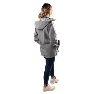 Back view of a person wearing a grey hooded jacket with dark jeans and sneakers