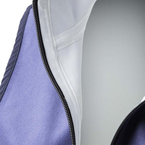 Close up of Gobi Heat jacket interior showing purple fleece lining and white zipper seam