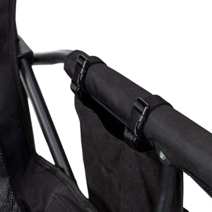 Black fabric storage pouch attached to Gobi Heat chair frame with plastic buckles