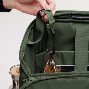 Got Bag backpack interior with a carabiner holding keys and a water bottle in the side pocket