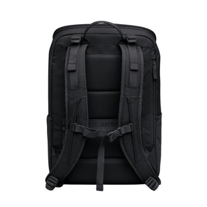 Back view of a black Got Bag backpack with padded shoulder straps and chest buckle