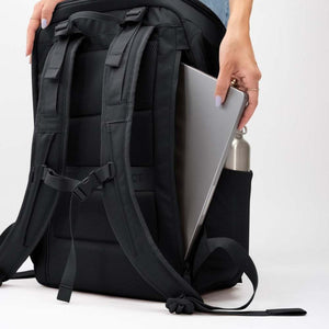 Got Bag black backpack with laptop being inserted into side compartment