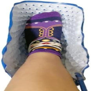Polar Products foot cooling wrap around a foot wearing a patterned sock