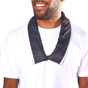 Man wearing a black cooling neck wrap over a white t-shirt